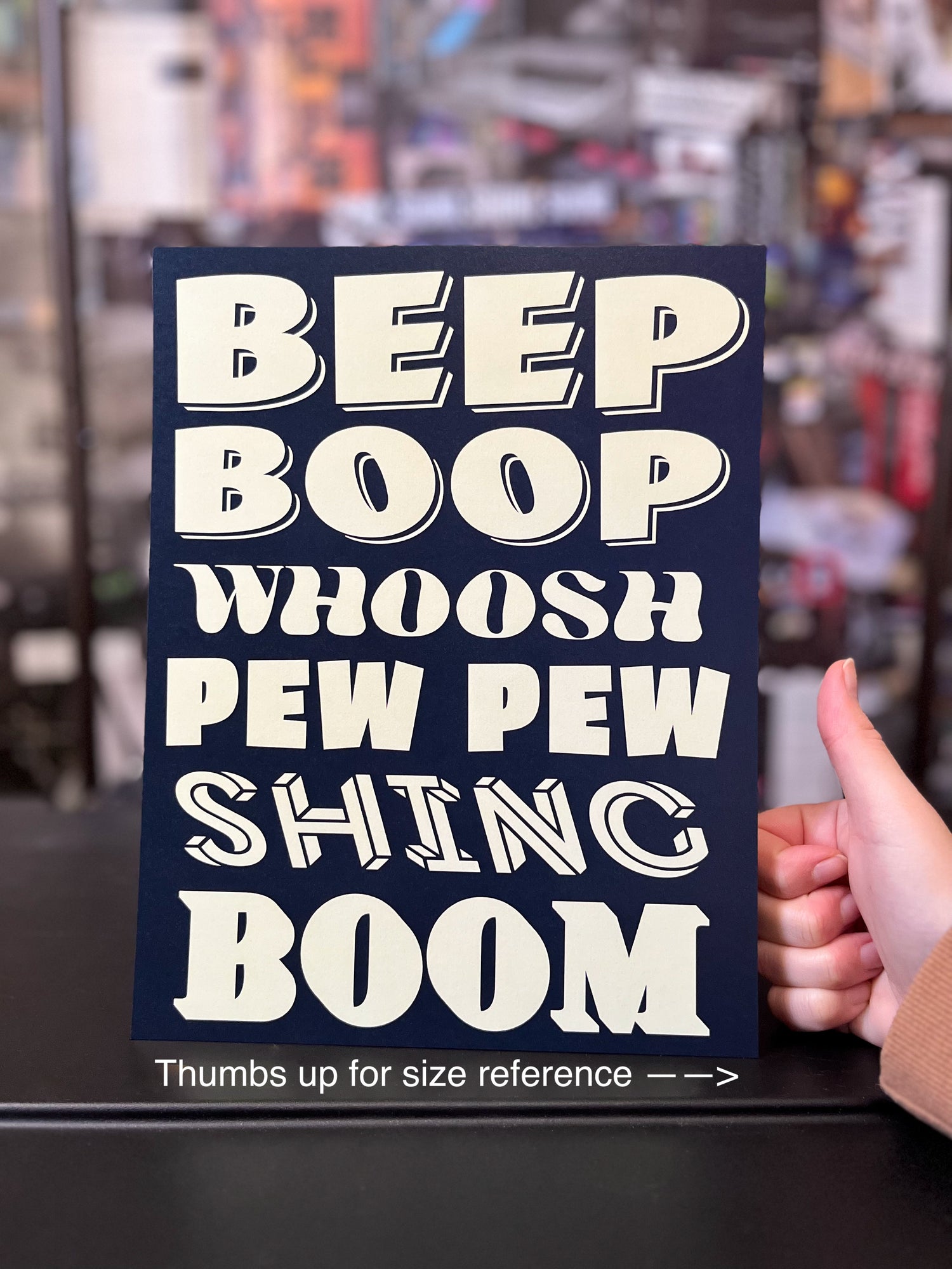 SFX Sounds audio engineer inspired print with the words beep boop, whoosh pew pew, shing, boom printed in cream on navy